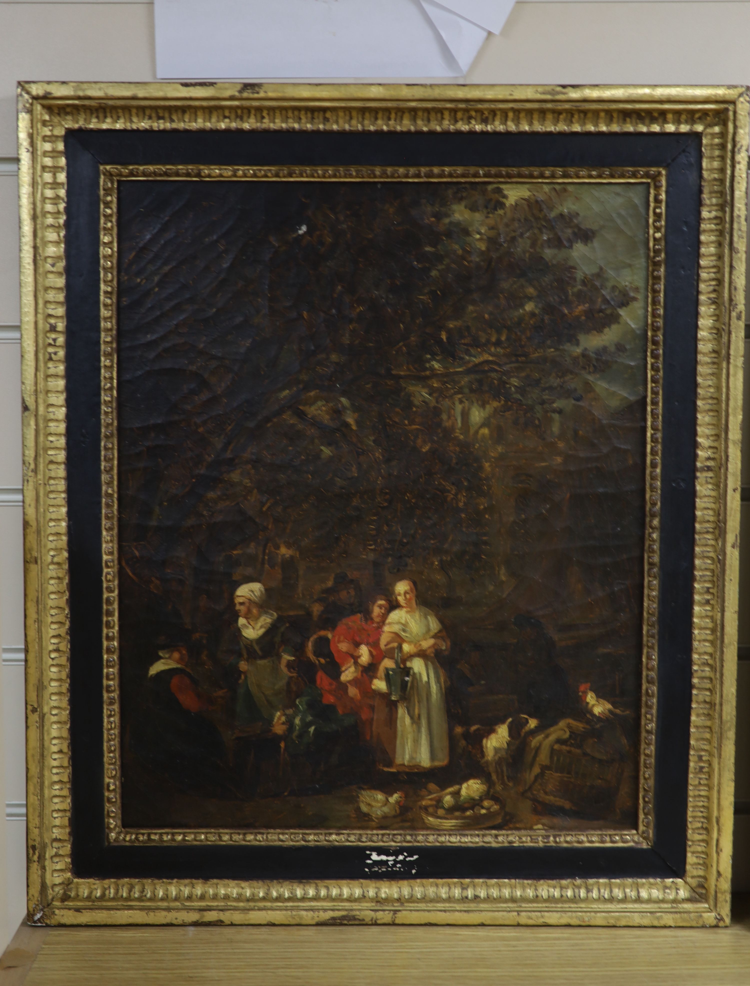 Continental school, conversing figures in landscape below a tree, oil on canvas, gilt carved wooden frame, indistinctly signed verso, 39 x 31cm.